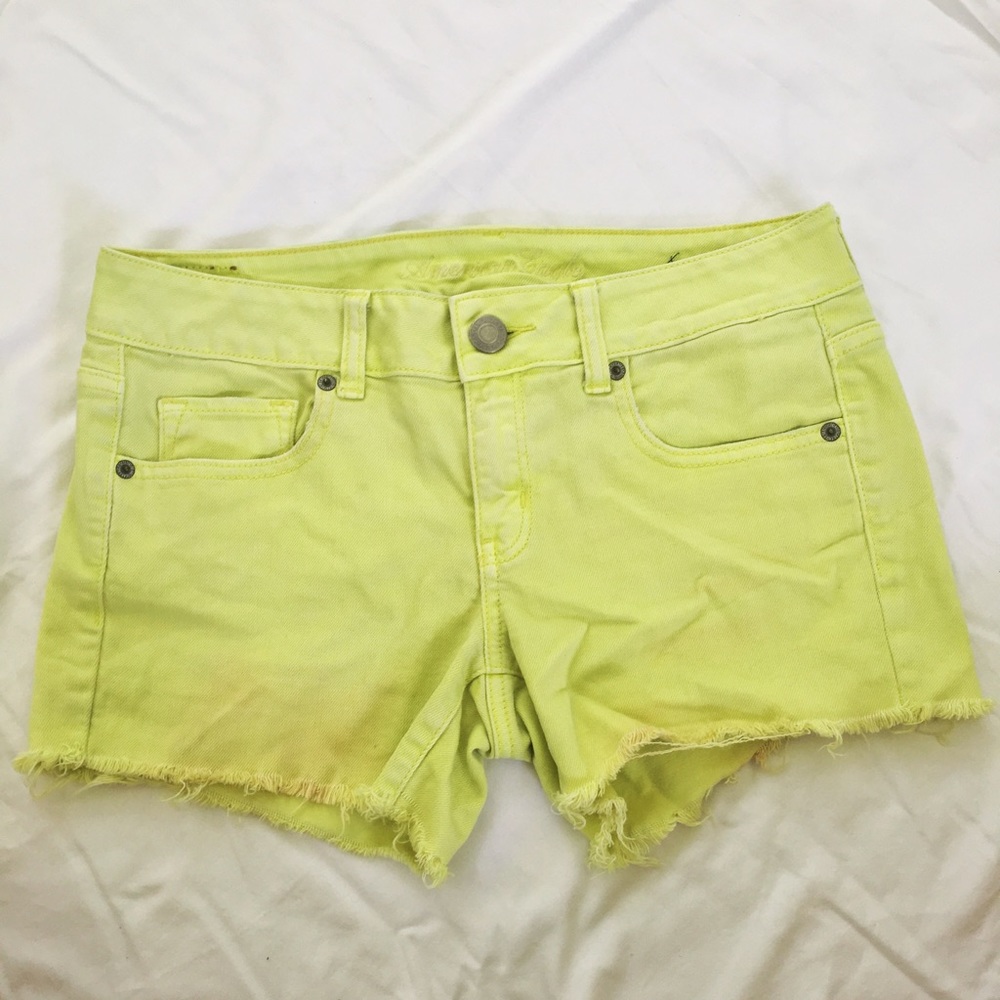 American Eagle fray shorts in Neon yellow (size 6)